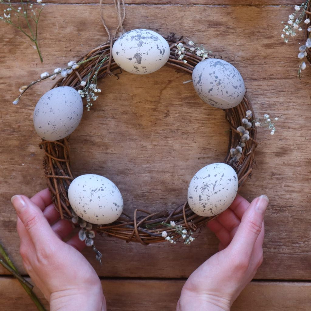 alt="rustic easter wreath featuring handpainted speckled eggs, pussy willow and gypsophila. Available from Bramble and Fox UK cottagecore homewares"