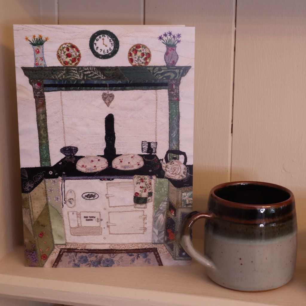alt="cosy applique Aga artwork card by textile artist Josie Russell. Available at Bramble and Fox UK hygge gift shop"
