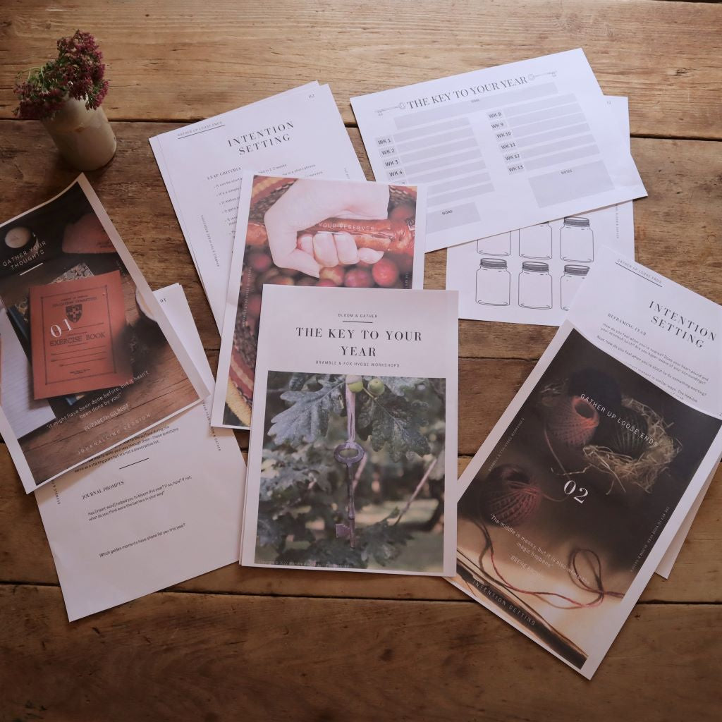 alt="flatlay of materials from The Key to Your Year: Bloom and Gather hygge mentoring workshop. Available from Bramble and Fox UK hygge shop"