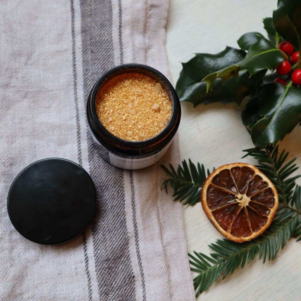 Luxurious golden bath salts made with a blend of pure orange, clove and frankincense essential oils, rich mineral salts and kaolin clay. Presented in an amber glass jar. Available from Bramble and Fox UK hygge shop. 