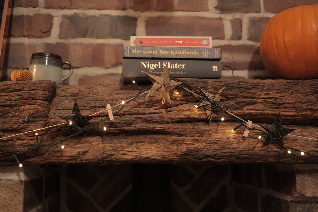 handmade brown paper origami lucky star garland with pegs by Raine and Son. Perfect for Scandi interiors.