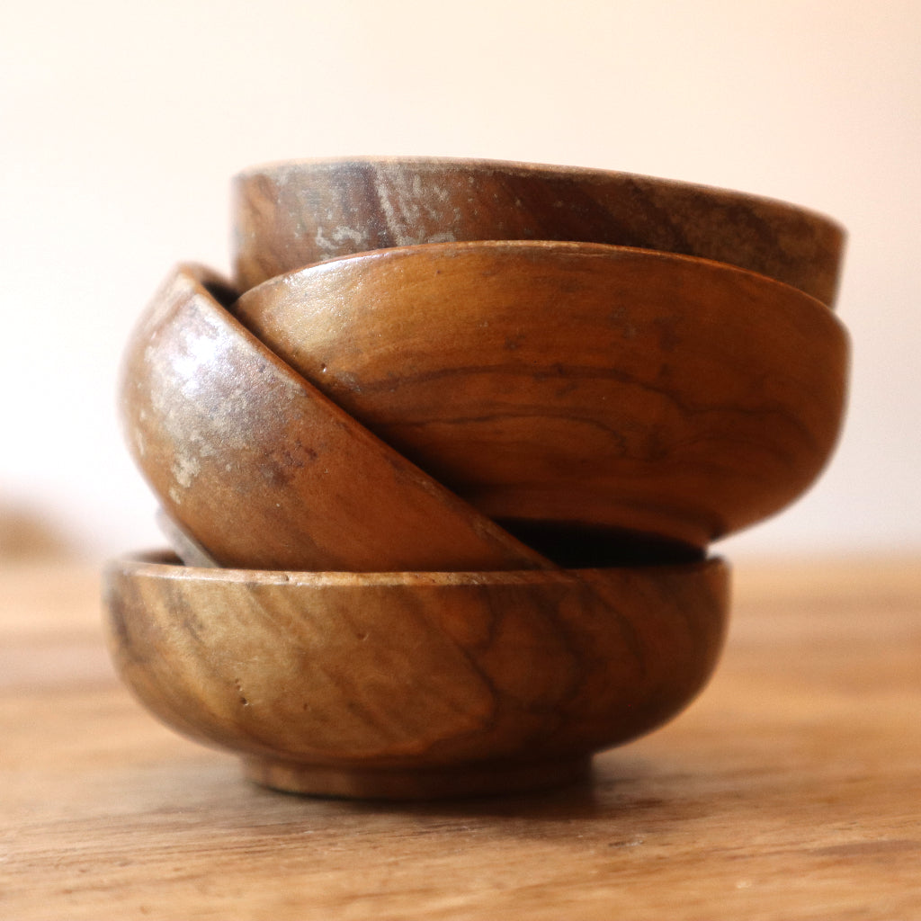 alt="a stack of vintage wooden nibble bowls with attractive graining from Bramble and Fox UK hygge homeware shop"