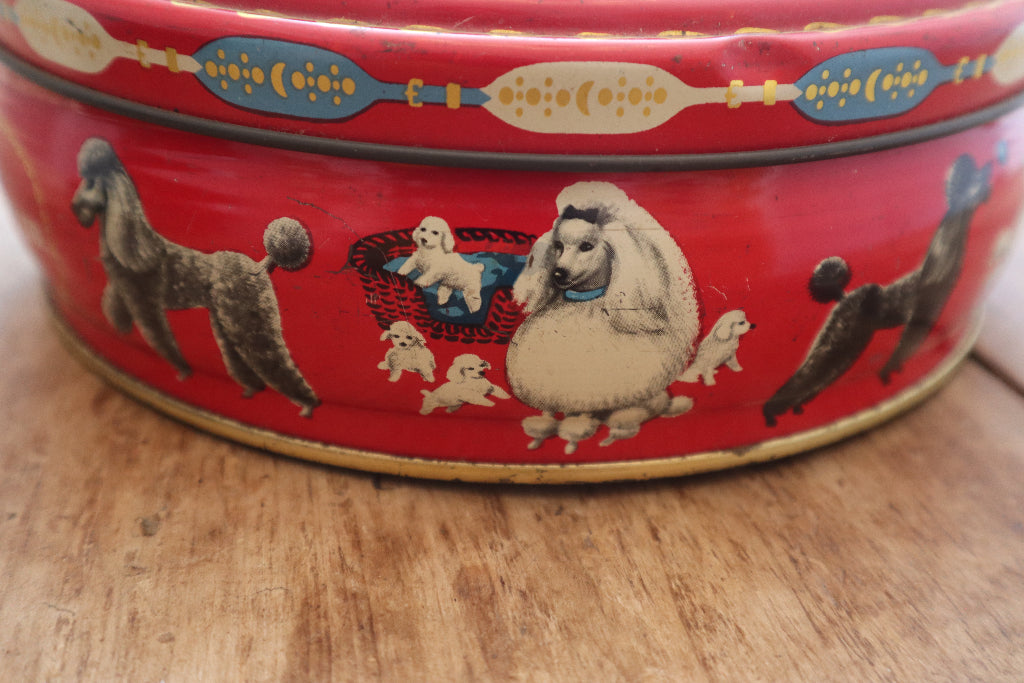 alt="close up of cream and charcoal poodles on peek and frean vintage biscuit tin. Available at Bramble and Fox UK cottagecore shop"