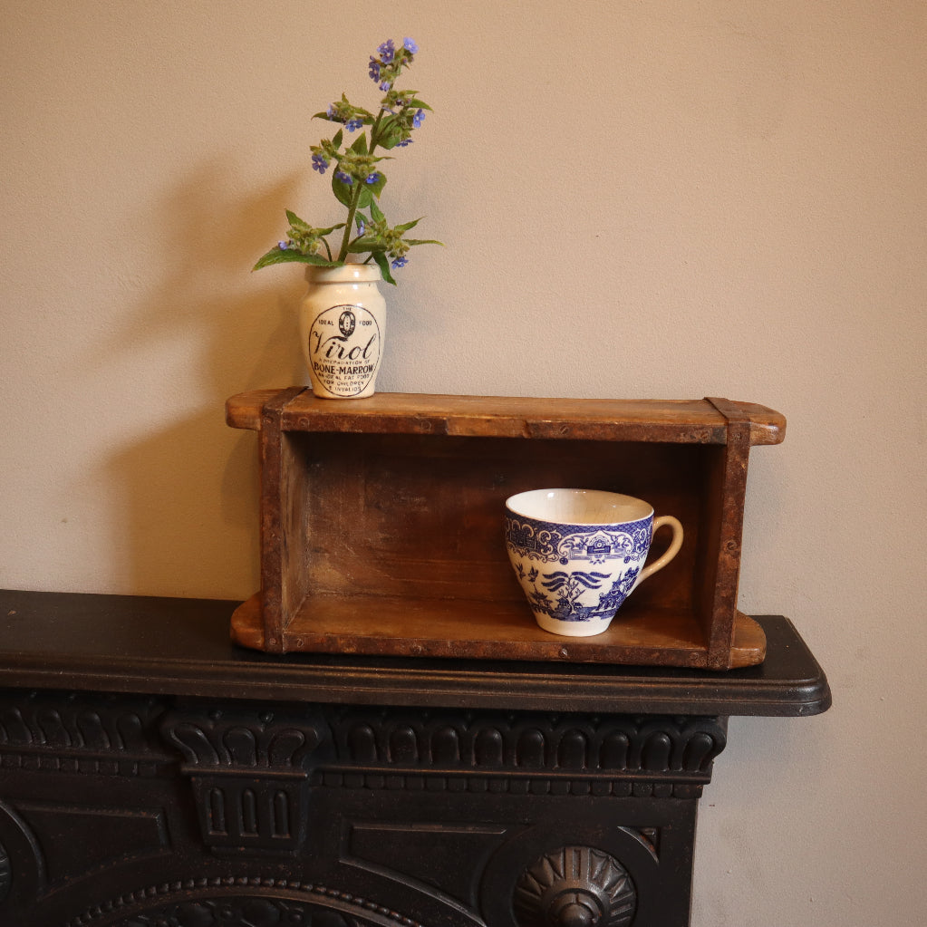 alt="vintage wooden brick mould displaying a virol jar and china cup. Available from Bramble and Fox UK hygge shop"